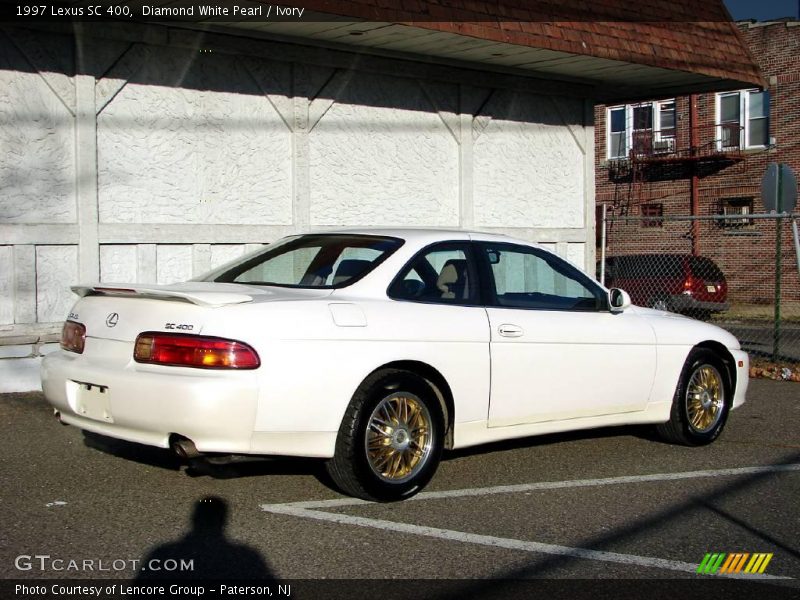 Diamond White Pearl / Ivory 1997 Lexus SC 400