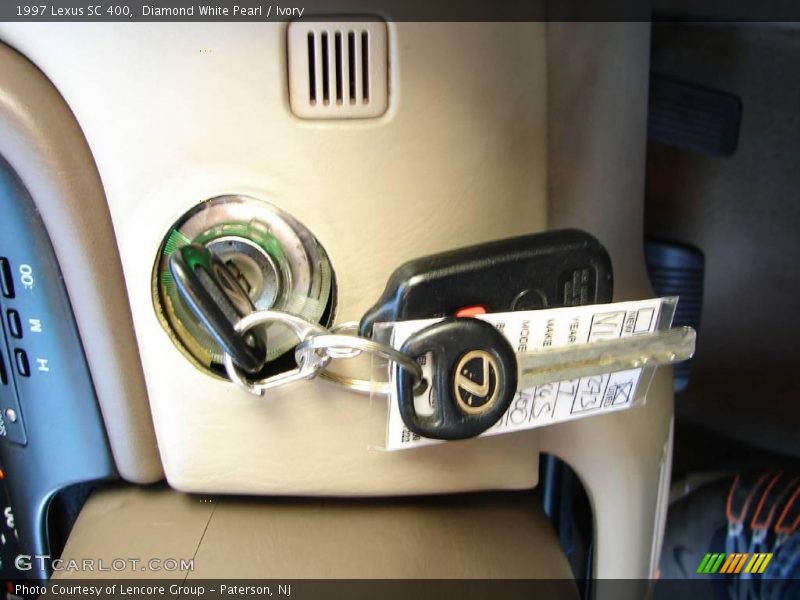 Diamond White Pearl / Ivory 1997 Lexus SC 400