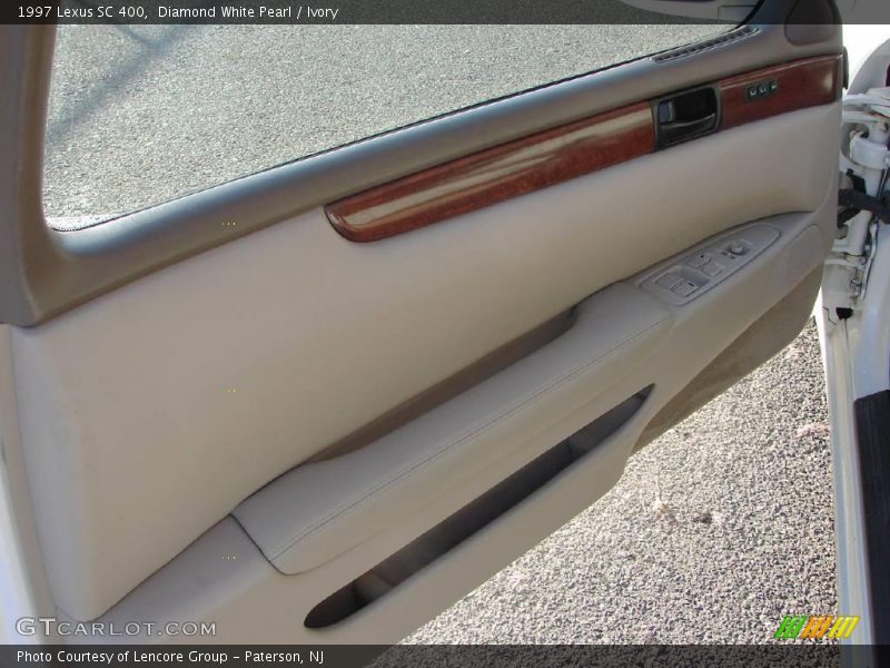 Diamond White Pearl / Ivory 1997 Lexus SC 400
