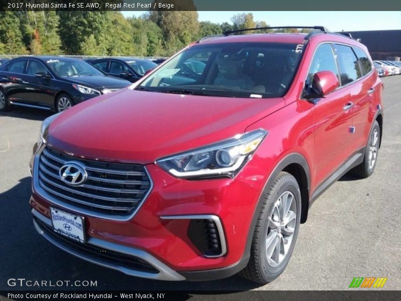 Regal Red Pearl / Beige 2017 Hyundai Santa Fe SE AWD