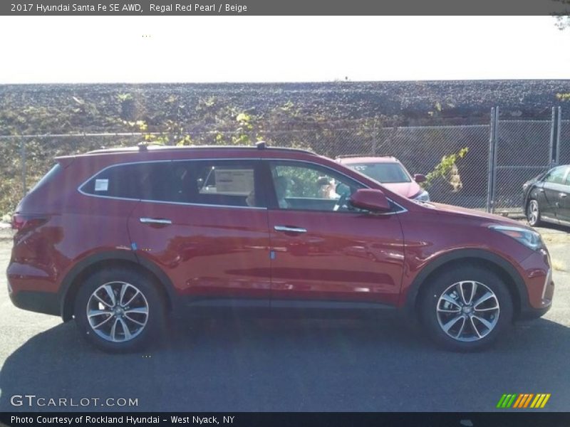 Regal Red Pearl / Beige 2017 Hyundai Santa Fe SE AWD