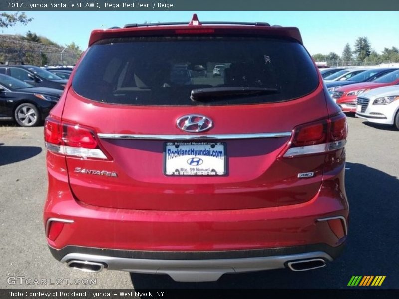 Regal Red Pearl / Beige 2017 Hyundai Santa Fe SE AWD