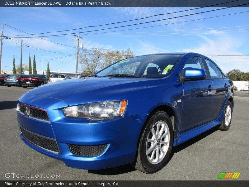 Octane Blue Pearl / Black 2012 Mitsubishi Lancer SE AWD