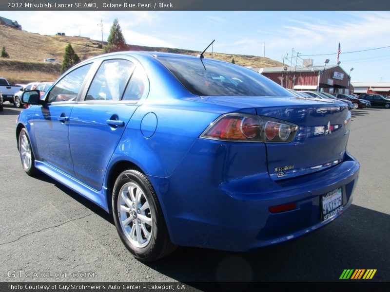 Octane Blue Pearl / Black 2012 Mitsubishi Lancer SE AWD