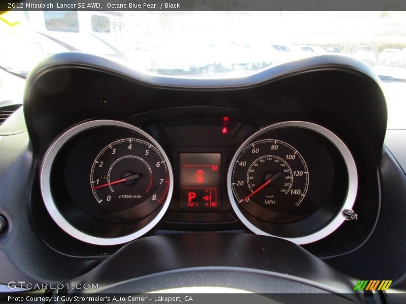 Octane Blue Pearl / Black 2012 Mitsubishi Lancer SE AWD