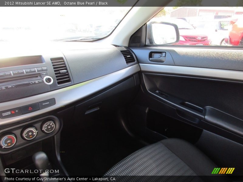 Octane Blue Pearl / Black 2012 Mitsubishi Lancer SE AWD