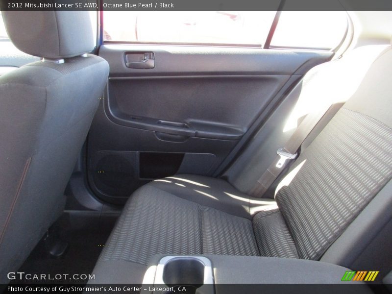Octane Blue Pearl / Black 2012 Mitsubishi Lancer SE AWD