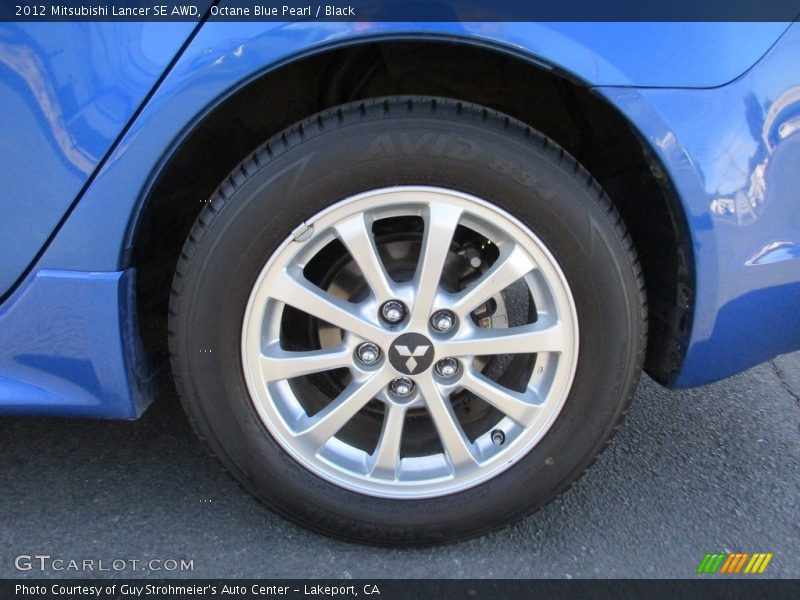 Octane Blue Pearl / Black 2012 Mitsubishi Lancer SE AWD