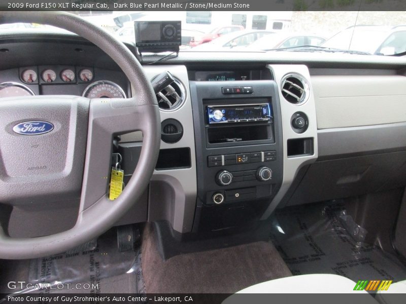 Dark Blue Pearl Metallic / Stone/Medium Stone 2009 Ford F150 XLT Regular Cab
