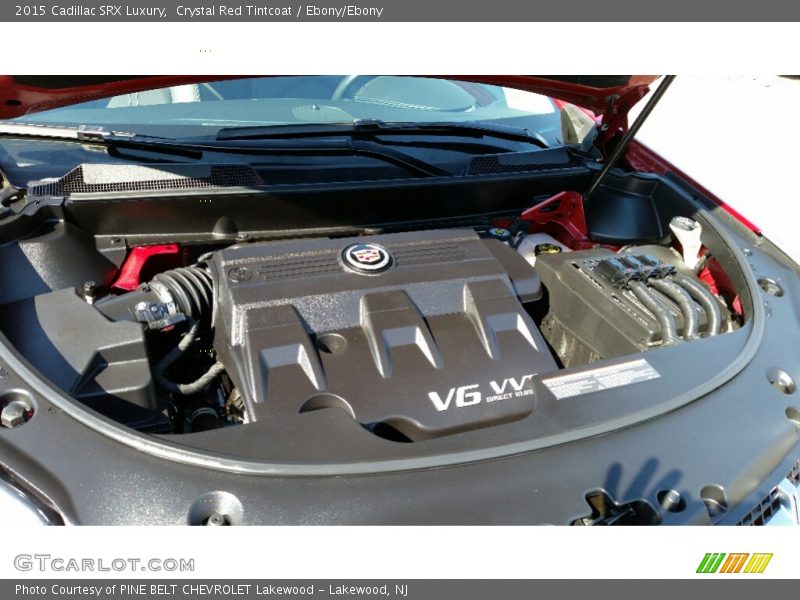 Crystal Red Tintcoat / Ebony/Ebony 2015 Cadillac SRX Luxury