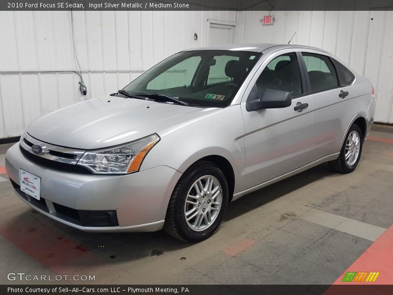 Ingot Silver Metallic / Medium Stone 2010 Ford Focus SE Sedan