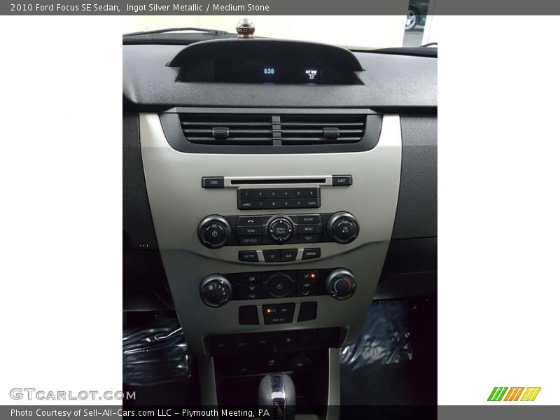 Ingot Silver Metallic / Medium Stone 2010 Ford Focus SE Sedan