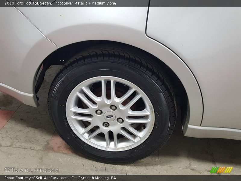 Ingot Silver Metallic / Medium Stone 2010 Ford Focus SE Sedan