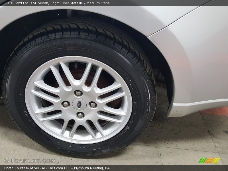 Ingot Silver Metallic / Medium Stone 2010 Ford Focus SE Sedan