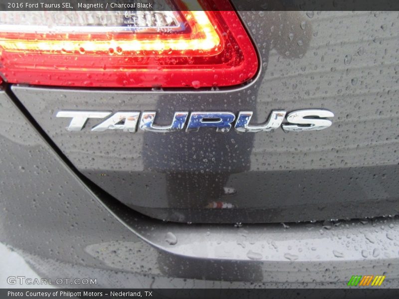Magnetic / Charcoal Black 2016 Ford Taurus SEL