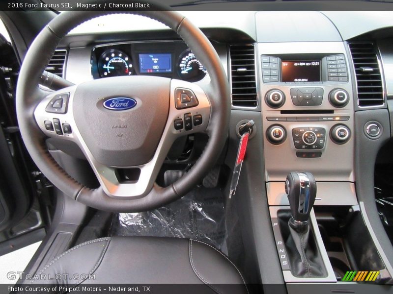 Magnetic / Charcoal Black 2016 Ford Taurus SEL