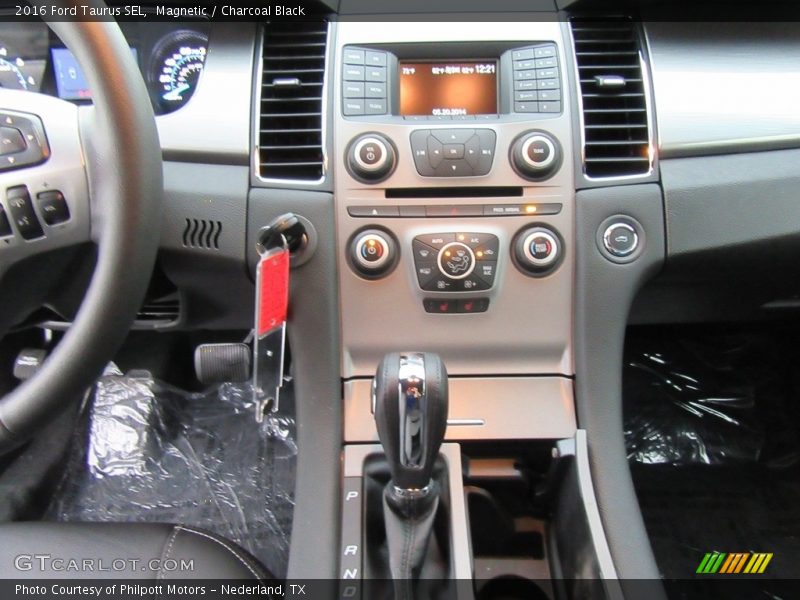Magnetic / Charcoal Black 2016 Ford Taurus SEL
