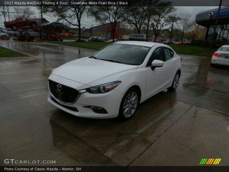 Front 3/4 View of 2017 MAZDA3 Touring 4 Door