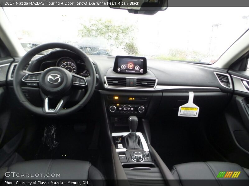 Snowflake White Pearl Mica / Black 2017 Mazda MAZDA3 Touring 4 Door