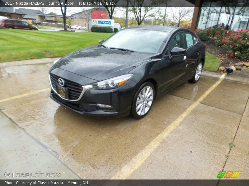 Front 3/4 View of 2017 MAZDA3 Touring 4 Door