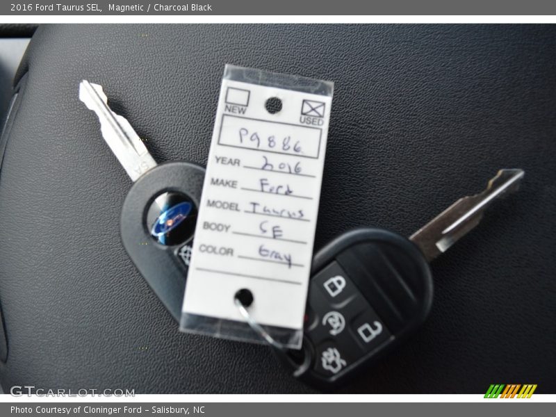 Magnetic / Charcoal Black 2016 Ford Taurus SEL