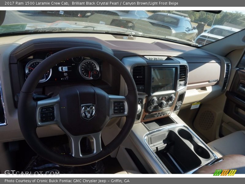 Brilliant Black Crystal Pearl / Canyon Brown/Light Frost Beige 2017 Ram 1500 Laramie Crew Cab