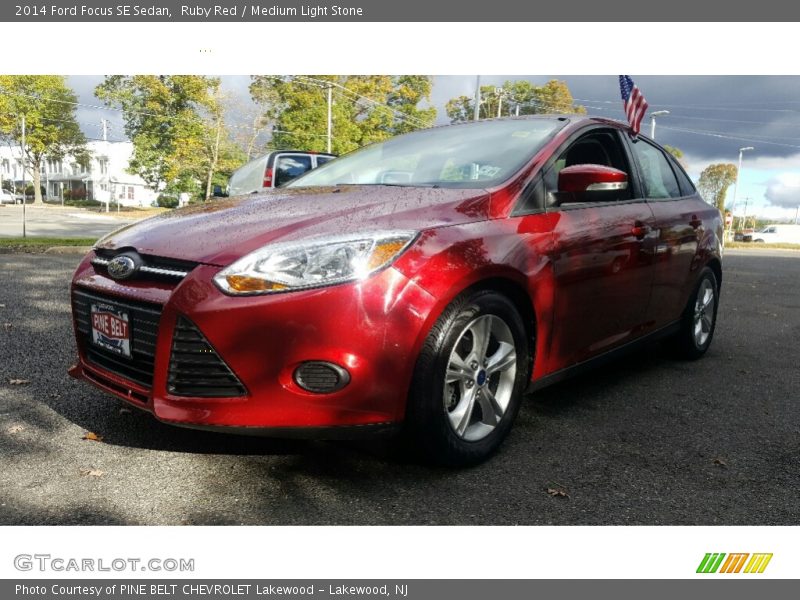 Ruby Red / Medium Light Stone 2014 Ford Focus SE Sedan