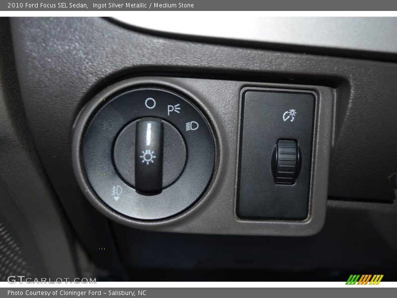 Ingot Silver Metallic / Medium Stone 2010 Ford Focus SEL Sedan