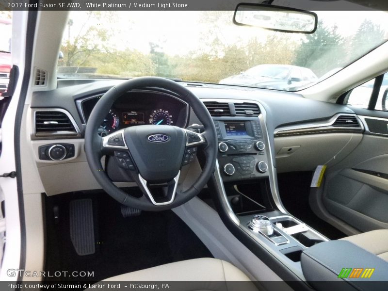 White Platinum / Medium Light Stone 2017 Ford Fusion SE AWD