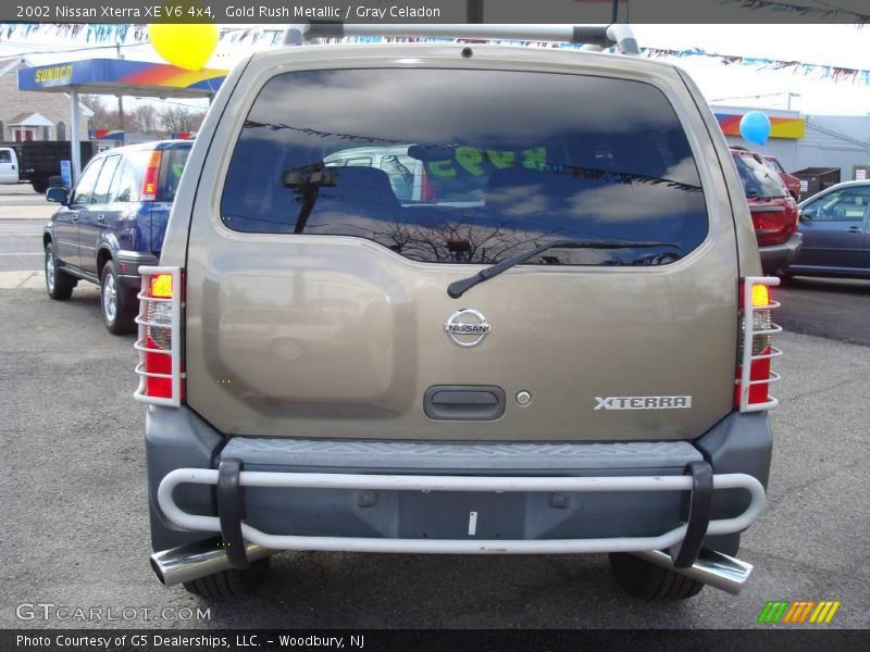 Gold Rush Metallic / Gray Celadon 2002 Nissan Xterra XE V6 4x4