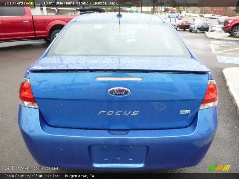 Blue Flame Metallic / Charcoal Black 2010 Ford Focus SES Sedan