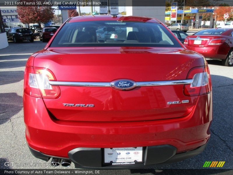 Red Candy / Charcoal Black 2011 Ford Taurus SEL AWD