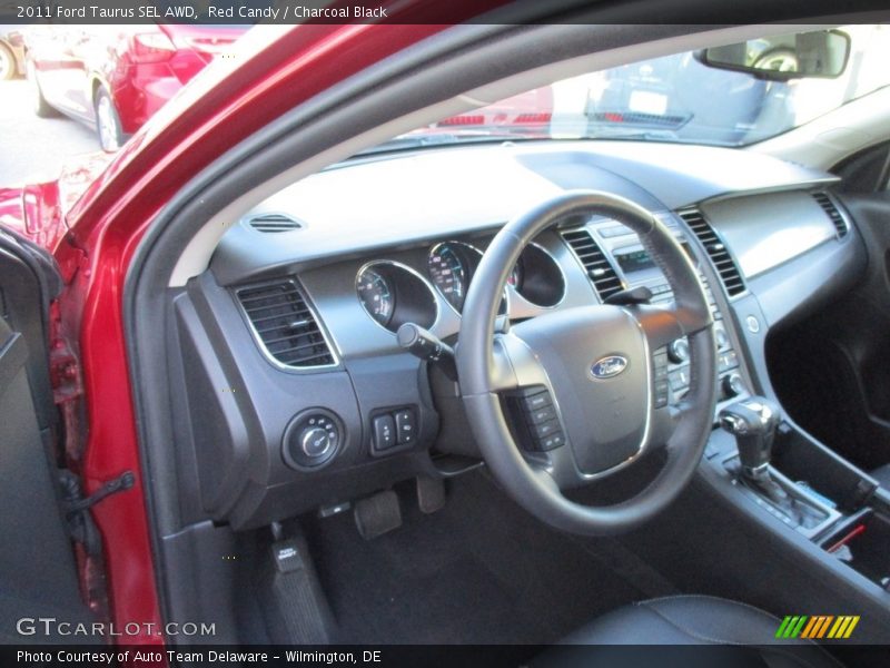 Red Candy / Charcoal Black 2011 Ford Taurus SEL AWD