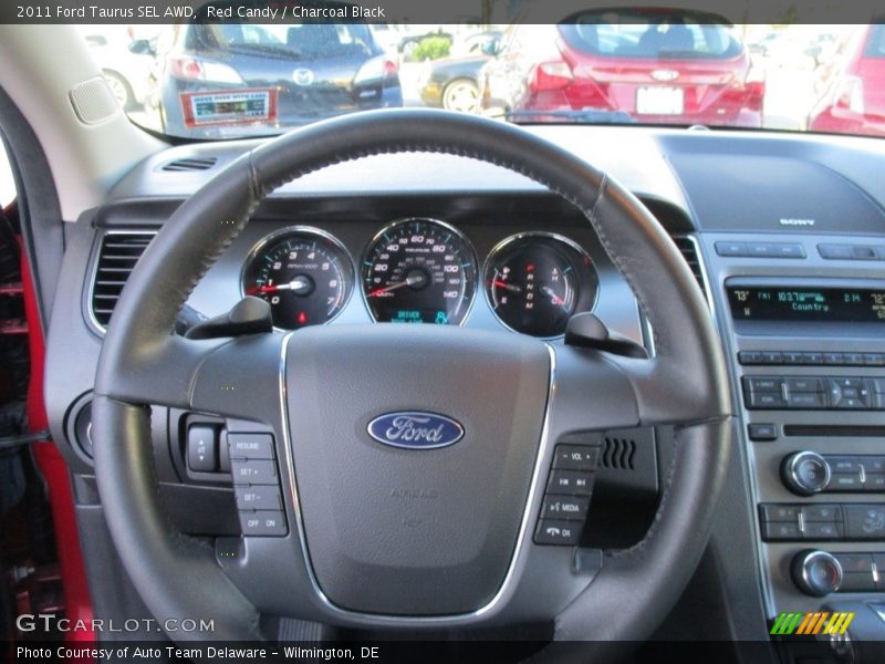 Red Candy / Charcoal Black 2011 Ford Taurus SEL AWD