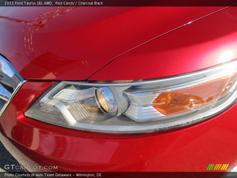 Red Candy / Charcoal Black 2011 Ford Taurus SEL AWD