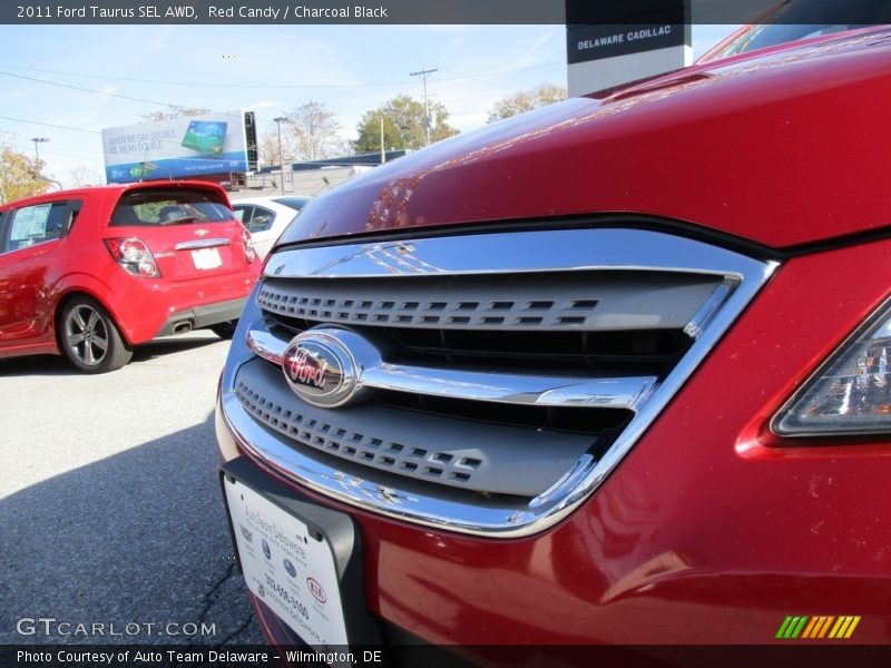 Red Candy / Charcoal Black 2011 Ford Taurus SEL AWD