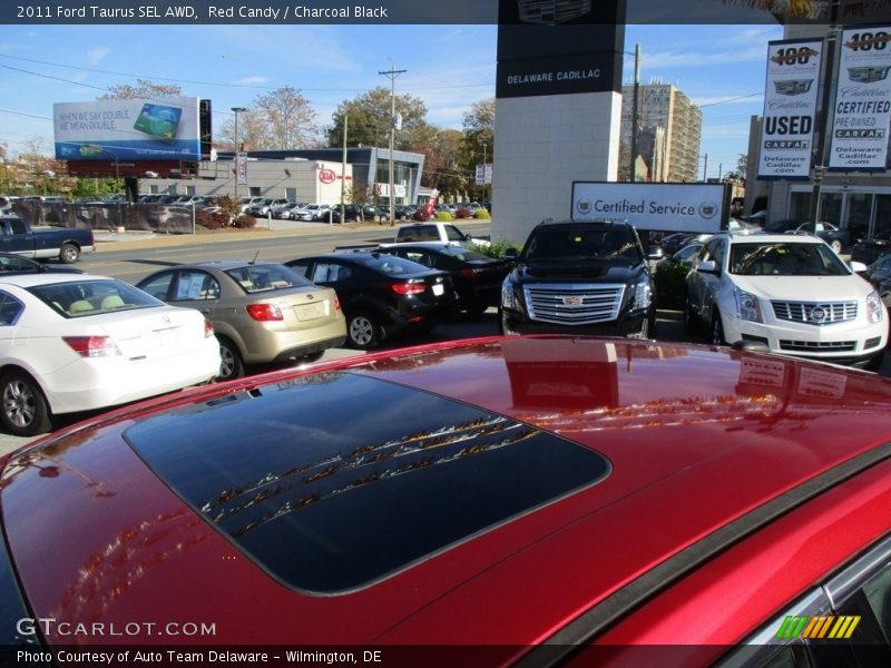 Red Candy / Charcoal Black 2011 Ford Taurus SEL AWD