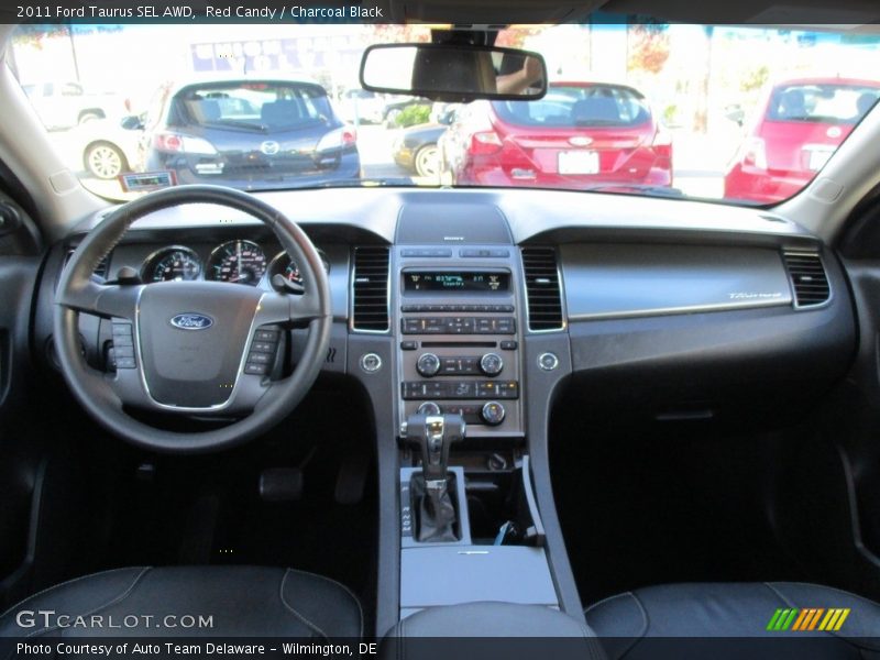 Red Candy / Charcoal Black 2011 Ford Taurus SEL AWD