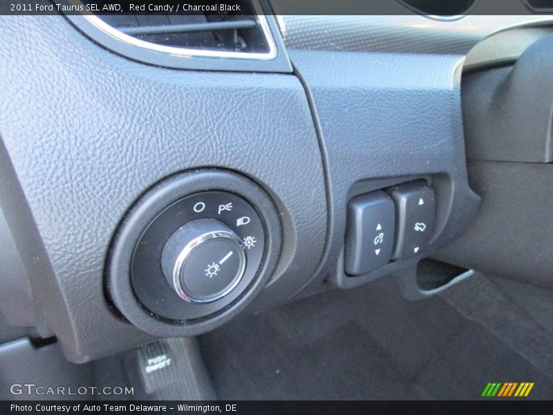 Red Candy / Charcoal Black 2011 Ford Taurus SEL AWD