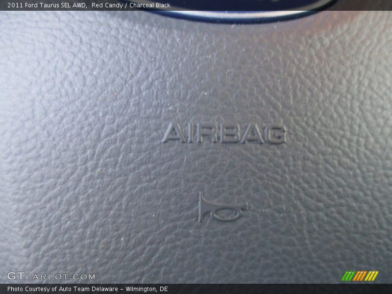 Red Candy / Charcoal Black 2011 Ford Taurus SEL AWD