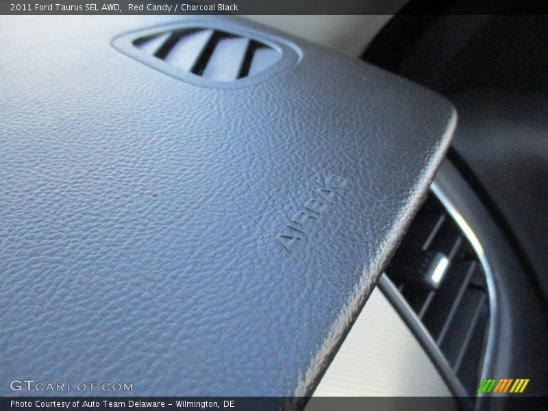 Red Candy / Charcoal Black 2011 Ford Taurus SEL AWD