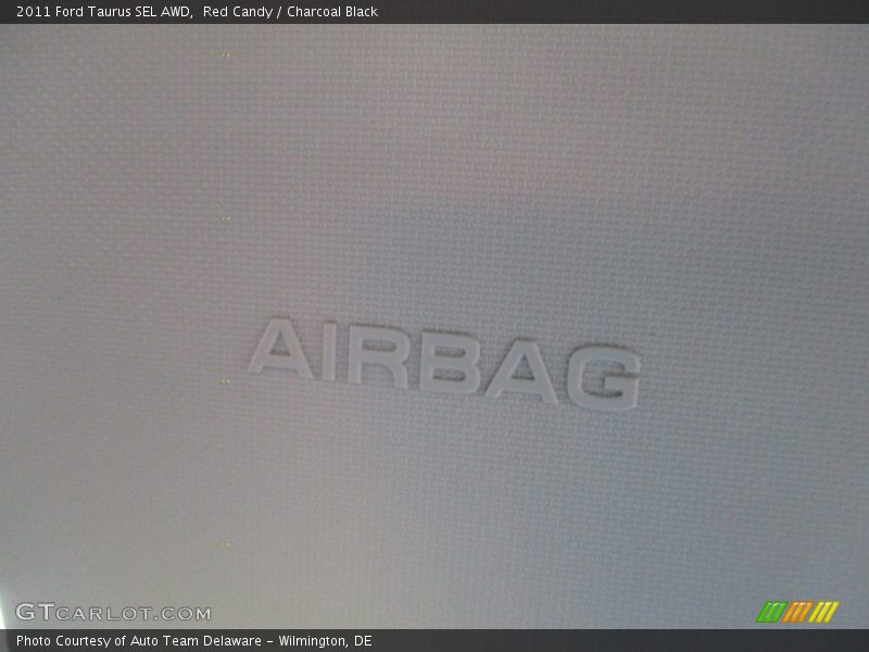 Red Candy / Charcoal Black 2011 Ford Taurus SEL AWD