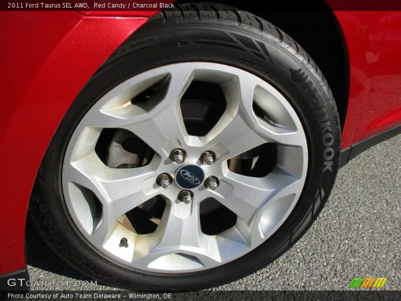 Red Candy / Charcoal Black 2011 Ford Taurus SEL AWD