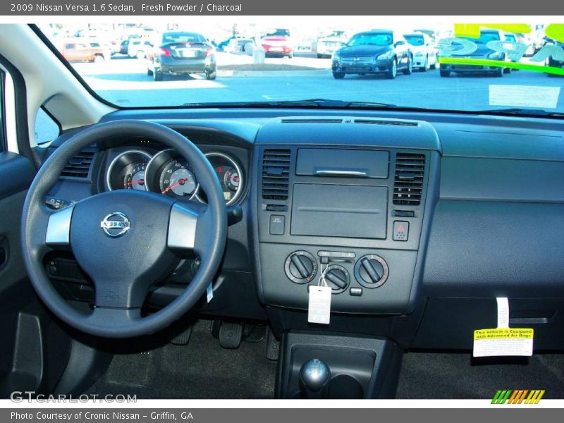 Fresh Powder / Charcoal 2009 Nissan Versa 1.6 Sedan