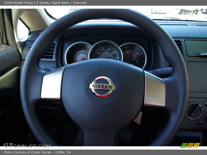 Super Black / Charcoal 2009 Nissan Versa 1.6 Sedan