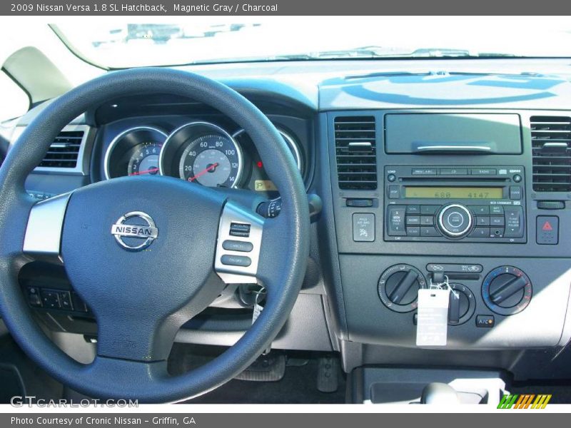 Magnetic Gray / Charcoal 2009 Nissan Versa 1.8 SL Hatchback