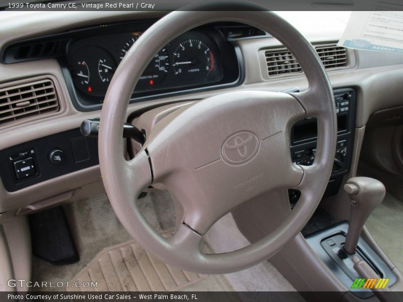 Vintage Red Pearl / Gray 1999 Toyota Camry CE