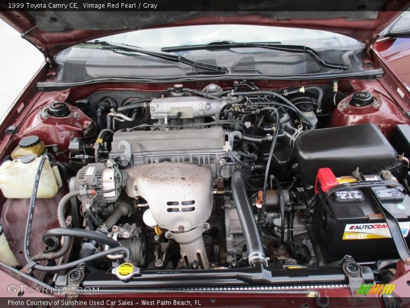 Vintage Red Pearl / Gray 1999 Toyota Camry CE