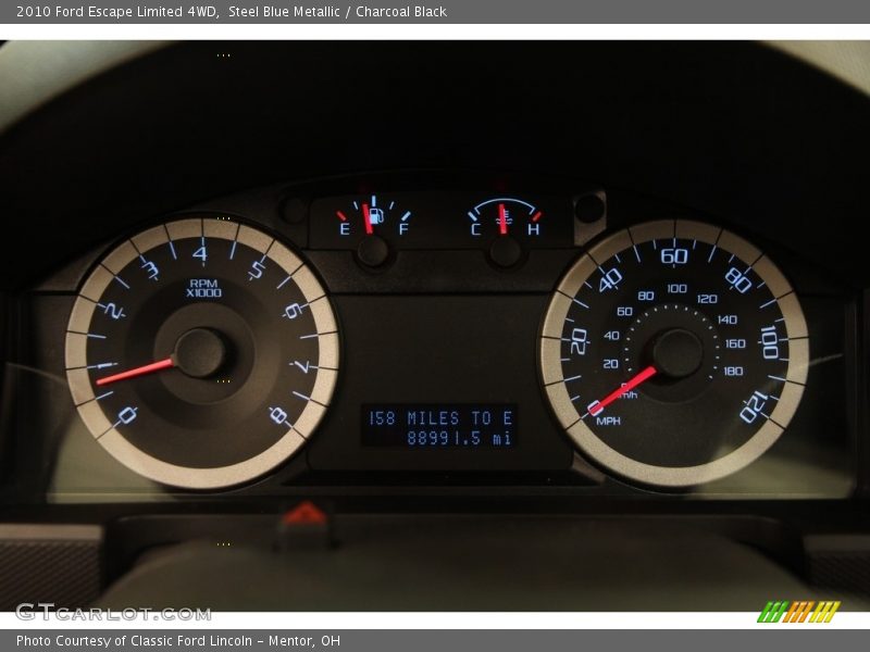 Steel Blue Metallic / Charcoal Black 2010 Ford Escape Limited 4WD