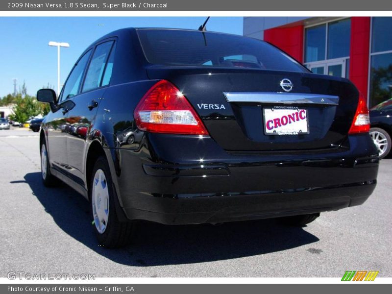 Super Black / Charcoal 2009 Nissan Versa 1.8 S Sedan